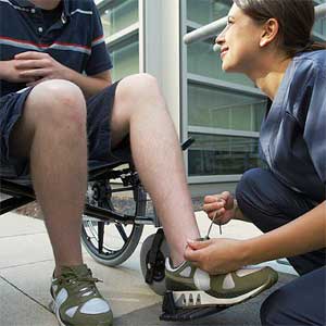 caregiver ties shoes